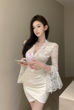 Elegant White Lace Top with Bell Sleeves and Wrap Skirt