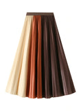 TWO-COLOR PLEATED SLIM LONG SKIRT