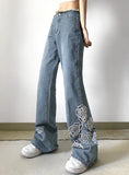 EMBROIDERED FLOWER RAW EDGES JEANS
