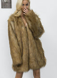Woman With A Long V Neck Coat In Imitation Fur