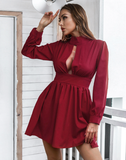high-necked long-sleeved pleated dress